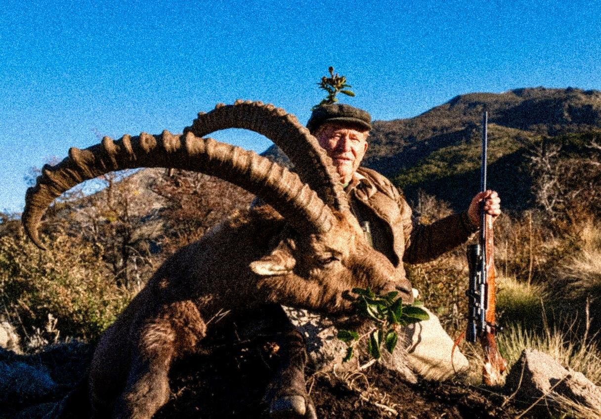 C.J. McElroy, founder of Safari Club International, with a heavy-horned free-range Alpine ibex taken at Parque Diana in Patagonia